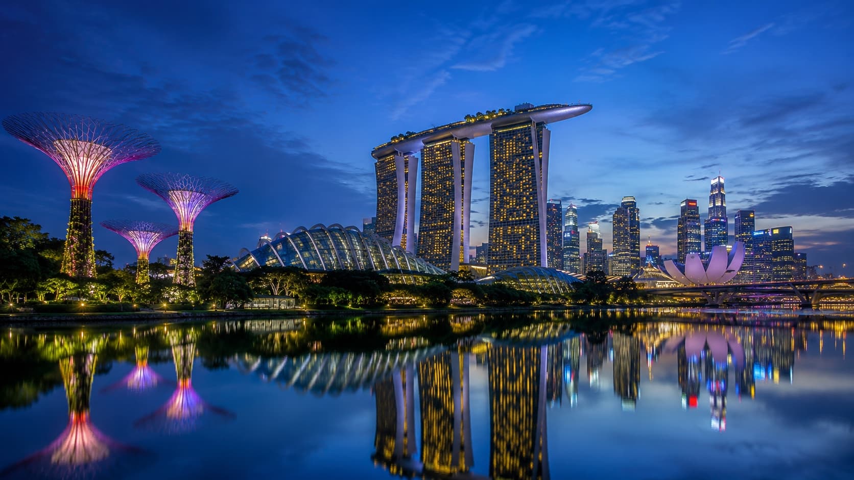 Singapore Marina Bay Sands and Gardens by the Bay at blue hour